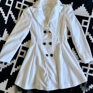 White pea coat with black tulle trim by Haniya